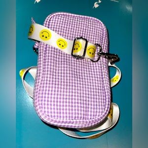 Checkered and smiley face purse